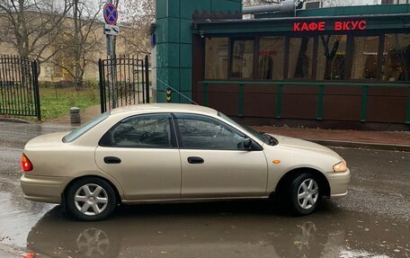 Mazda 323, 1998 год, 599 000 рублей, 4 фотография