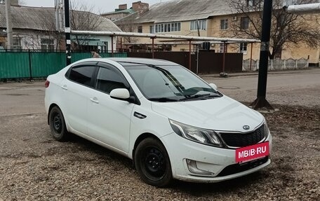 KIA Rio III рестайлинг, 2012 год, 950 000 рублей, 2 фотография