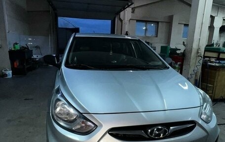 Hyundai Solaris II рестайлинг, 2011 год, 870 000 рублей, 21 фотография