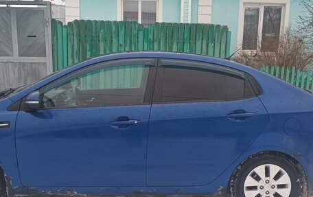 KIA Rio III рестайлинг, 2011 год, 650 000 рублей, 4 фотография