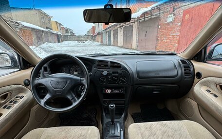 Mitsubishi Mirage VI рестайлинг, 2000 год, 235 000 рублей, 9 фотография