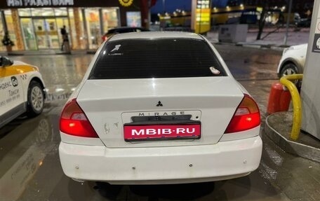 Mitsubishi Mirage VI рестайлинг, 2000 год, 185 000 рублей, 1 фотография