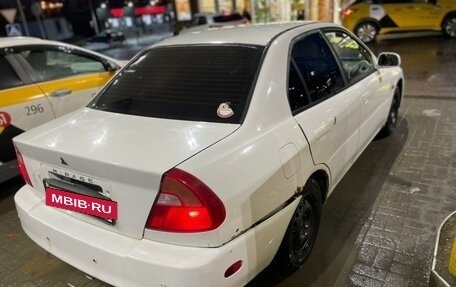 Mitsubishi Mirage VI рестайлинг, 2000 год, 185 000 рублей, 4 фотография