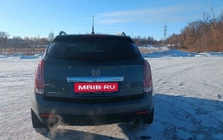 Cadillac SRX II рестайлинг, 2011 год, 1 299 999 рублей, 38 фотография