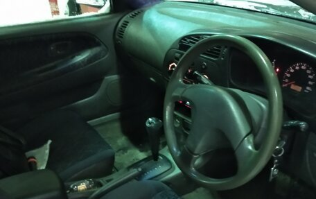 Mitsubishi Mirage VI рестайлинг, 1998 год, 120 000 рублей, 5 фотография