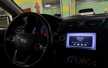 KIA Rio III рестайлинг, 2012 год, 910 000 рублей, 24 фотография