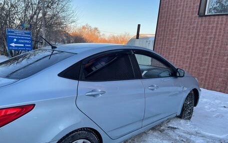 Hyundai Solaris II рестайлинг, 2011 год, 650 000 рублей, 13 фотография