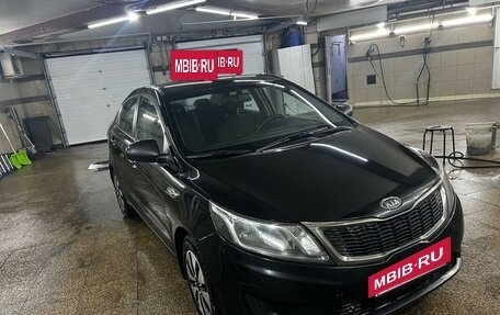 KIA Rio III рестайлинг, 2012 год, 777 000 рублей, 23 фотография