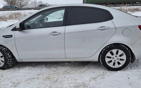 KIA Rio III рестайлинг, 2013 год, 1 199 000 рублей, 23 фотография