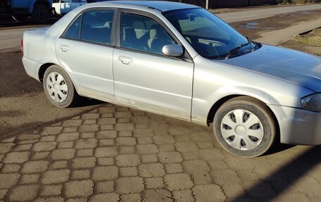 Mazda Familia, 1999 год, 225 000 рублей, 6 фотография