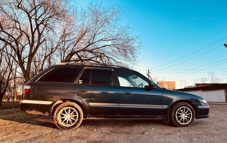 Mazda Capella, 1997 год, 400 000 рублей, 24 фотография