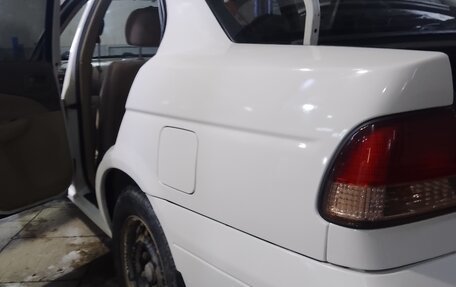 Nissan Sunny B15, 2004 год, 400 000 рублей, 6 фотография