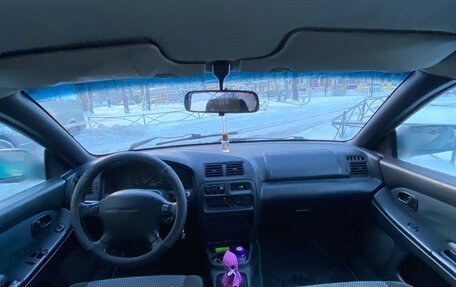 Mazda 323, 1997 год, 135 000 рублей, 9 фотография