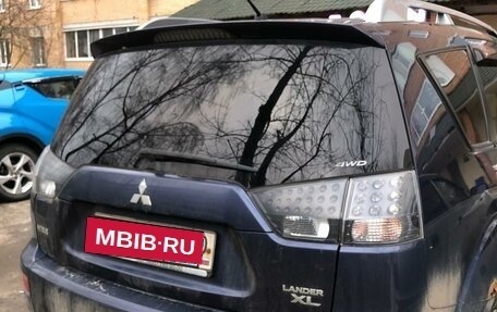 Mitsubishi Outlander III рестайлинг 3, 2007 год, 990 000 рублей, 4 фотография