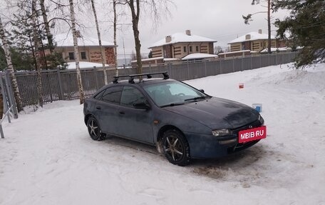 Mazda 323, 1998 год, 150 000 рублей, 10 фотография