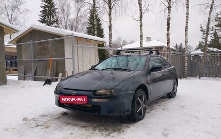 Mazda 323, 1998 год, 150 000 рублей, 11 фотография