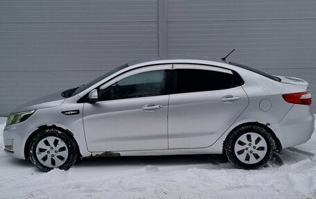 KIA Rio III рестайлинг, 2011 год, 670 000 рублей, 4 фотография