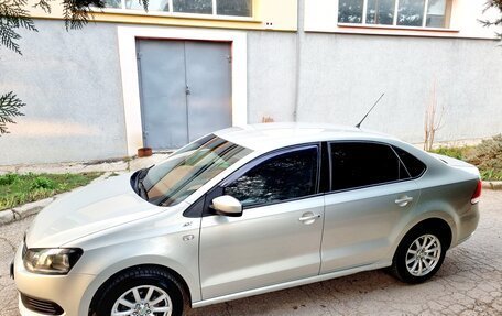 Volkswagen Polo VI (EU Market), 2012 год, 950 000 рублей, 24 фотография