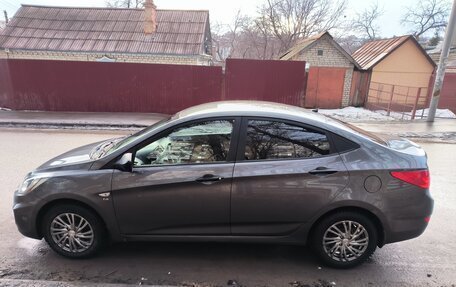 Hyundai Solaris II рестайлинг, 2011 год, 970 000 рублей, 4 фотография