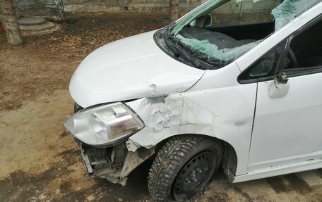 Nissan Tiida, 2010 год, 350 000 рублей, 6 фотография