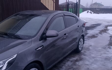 KIA Rio III рестайлинг, 2012 год, 860 000 рублей, 2 фотография