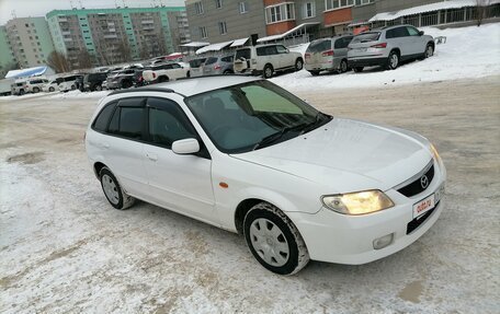 Mazda Familia, 2003 год, 370 000 рублей, 17 фотография