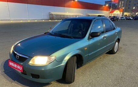 Mazda 323, 2001 год, 369 000 рублей, 23 фотография