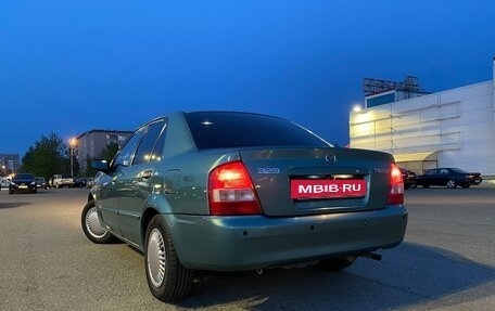 Mazda 323, 2001 год, 369 000 рублей, 24 фотография