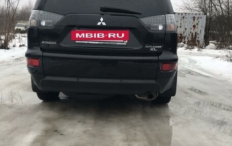 Mitsubishi Outlander III рестайлинг 3, 2010 год, 1 030 000 рублей, 4 фотография