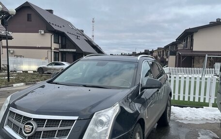 Cadillac SRX II рестайлинг, 2011 год, 970 000 рублей, 1 фотография