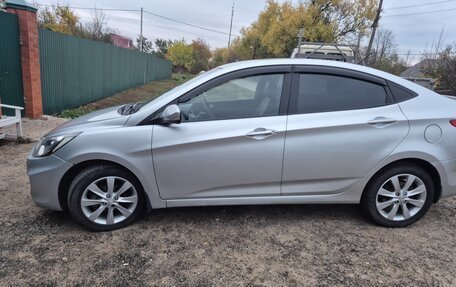 Hyundai Solaris II рестайлинг, 2011 год, 730 000 рублей, 4 фотография