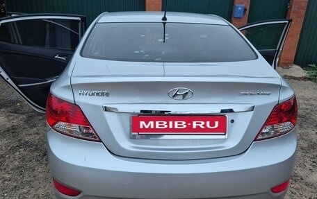 Hyundai Solaris II рестайлинг, 2011 год, 730 000 рублей, 10 фотография