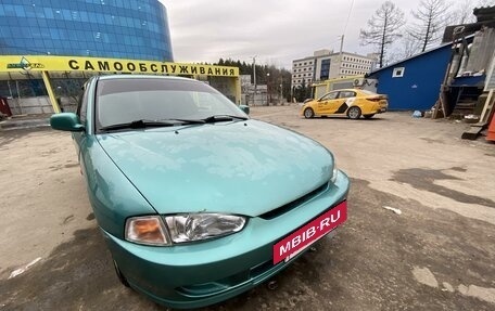 Mitsubishi Colt VI рестайлинг, 1996 год, 350 000 рублей, 26 фотография