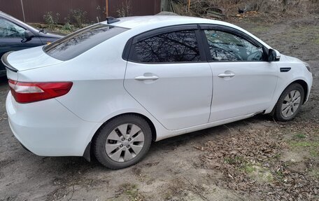 KIA Rio III рестайлинг, 2012 год, 715 000 рублей, 2 фотография