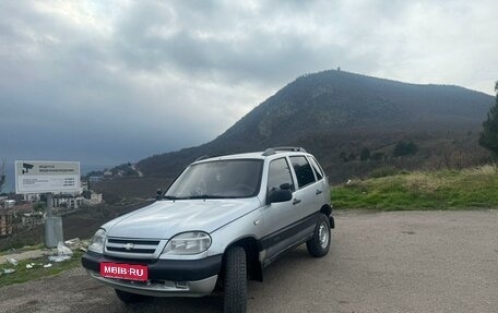 Chevrolet Niva I рестайлинг, 2004 год, 590 000 рублей, 34 фотография