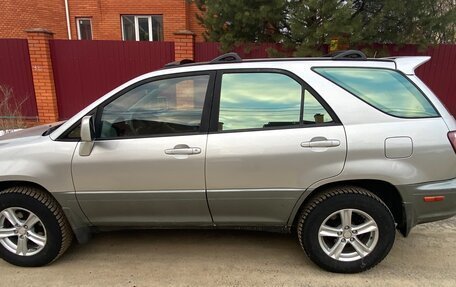 Lexus RX IV рестайлинг, 2000 год, 680 000 рублей, 5 фотография