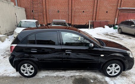 KIA Rio II, 2010 год, 14 фотография