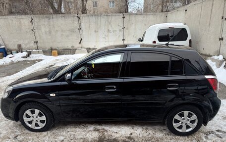 KIA Rio II, 2010 год, 13 фотография