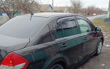 Nissan Tiida, 2010 год, 785 000 рублей, 29 фотография