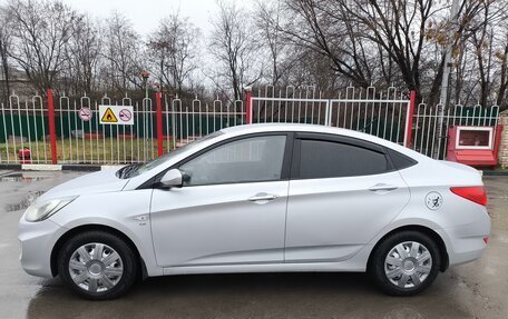 Hyundai Solaris II рестайлинг, 2011 год, 770 000 рублей, 10 фотография