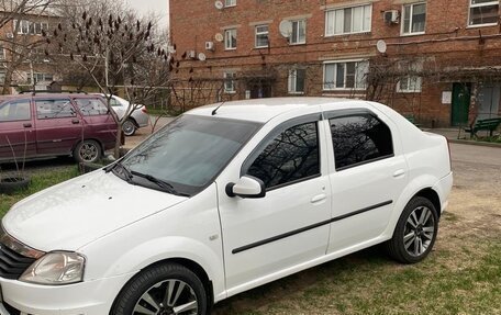 Renault Logan I, 2013 год, 600 000 рублей, 4 фотография