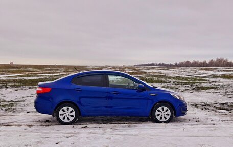 KIA Rio III рестайлинг, 2011 год, 648 000 рублей, 2 фотография