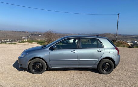 Toyota Corolla, 2004 год, 700 000 рублей, 2 фотография