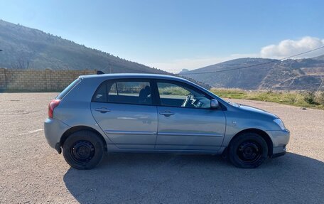 Toyota Corolla, 2004 год, 700 000 рублей, 6 фотография