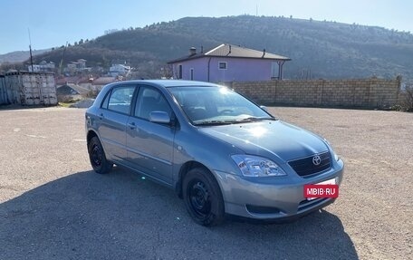 Toyota Corolla, 2004 год, 700 000 рублей, 7 фотография