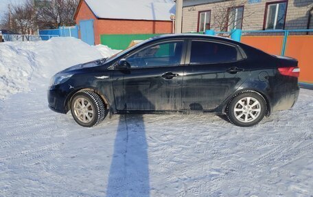 KIA Rio III рестайлинг, 2013 год, 710 000 рублей, 15 фотография