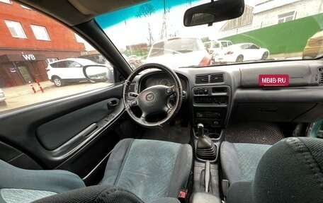 Mazda 323, 1998 год, 140 000 рублей, 8 фотография