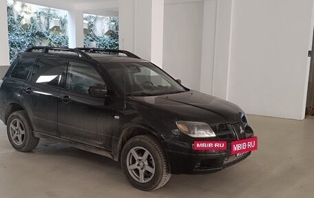 Mitsubishi Outlander III рестайлинг 3, 2002 год, 650 000 рублей, 11 фотография