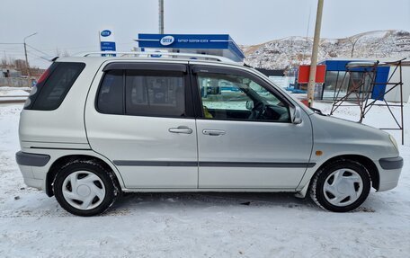 Toyota Raum I, 2002 год, 475 000 рублей, 32 фотография