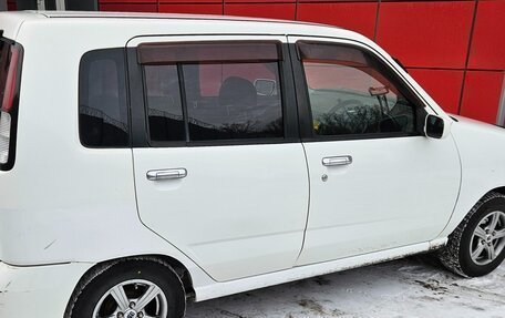 Nissan Cube II, 1999 год, 370 000 рублей, 2 фотография